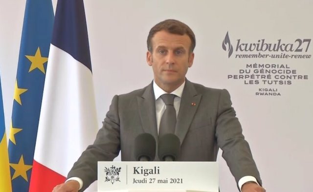French president Emmanuel Macron pays respect to genocide victims
