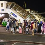 Over 150 African asylum seekers evacuated from Libya to Rwanda